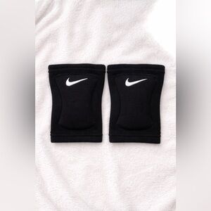 Nike Black Protective Knee Sleeve with White Swoosh